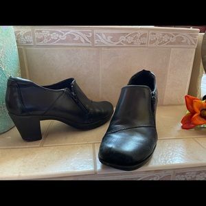 Cute ankle heeled Clark’s! Super comfy.